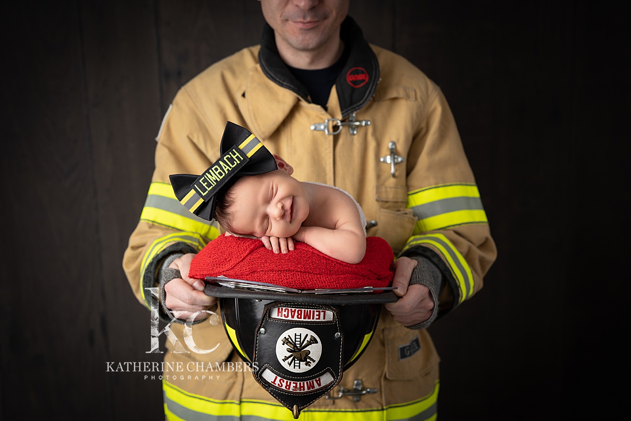 Newborn in Firefighter Gear